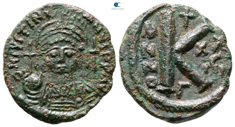 Justinian I AD 527-565. Constantinople
Half Follis or 20 Nummi Æ

23 mm, 5,71...