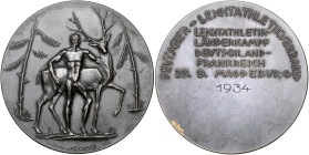 Medaillen u. Abzeichen zu Sportveranstaltungen. 
Magdeburg. Bronzemed. o.J. (Gravur 1934) auf den Leichtathletik-Länderkampf Deutschland-Frankreich, ...