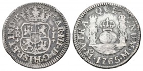 Carlos III (1759-1788). 1 real. 1765. México. M. (Cal-1545). Ag. 3,15 g. Cruces flanqueando el valor. MBC-. Est...30,00.