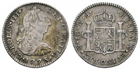 Carlos III (1759-1788). 1 real. 1773. México. FM. (Cal-no cita). Ag. 3,36 g. Ceca y ensayadores invertidos. Escasa. MBC+. Est...100,00.