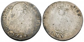 Carlos III (1759-1788). 2 reales. 1784. Ag. 4,92 g. Doble resello de Costa Rica para circular como 2 reales. (De Mey 433 y 474). Rara. BC. Est...60,00...