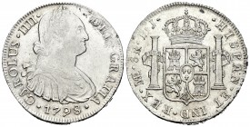 Carlos IV (1788-1808). 8 reales. 1798. Lima. IJ. (Cal-653). Ag. 26,99 g. Leve oxidación en anverso. Parte de brillo original. MBC+/EBC-. Est...110,00....
