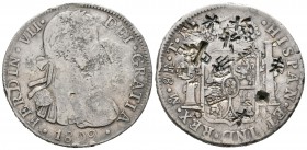 Fernando VII (1808-1833). 8 reales. 1809. México. TH. (Cal-539). Ag. 26,56 g. Busto imaginario. Resellos orientales. BC+. Est...80,00.