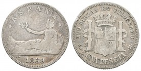 Gobierno Provisional (1868-1871). 1 peseta. 1869. Madrid. SNM. (Cal-14). Ag. 4,76 g. Leyenda ESPAÑA. BC. Est...30,00.