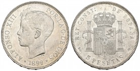 Alfonso XIII (1886-1931). 5 pesetas. 1899*18-99. Madrid. SGV. (Cal-28). Ag. 24,99 g. Brillo original. SC-. Est...80,00.