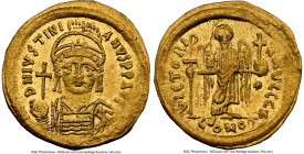 Justinian I the Great (AD 527-565). AV solidus (21mm, 4.48 gm, 6h). NGC AU 4/5 - 4/5, clipped. Constantinople, 7th officina, ca. AD 545-565. D N IVSTI...