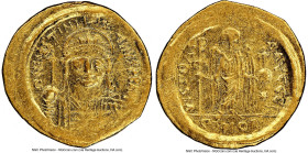Justinian I the Great (AD 527-565). AV solidus (21mm, 4.37 gm, 7h). NGC AU 4/5 - 2/5, graffito, clipped. Constantinople, 3rd officina, ca. AD 545-565....