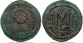 Justinian I the Great (AD 527-565). AE follis or 40 nummi (40mm, 22.94 gm, 6h). NGC Choice VF 5/5 - 4/5. Constantinople, 3rd officina, Regnal Year 14 ...