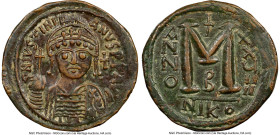 Justinian I the Great (AD 527-565). AE follis or 40 nummi (32mm, 6h). NGC XF, edge marks. Nicomedia, 2nd officina, Regnal Year 29 (AD 555/6). D N IVST...