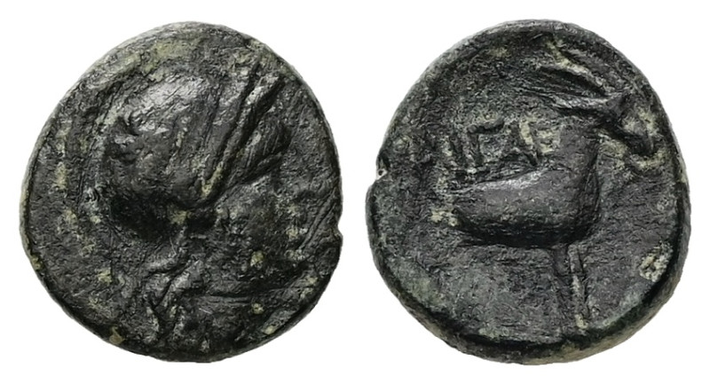 Aeolis, Aigai. AE, 1.66 g. - 12.72 mm. 2nd-1st centuries BC.
Obv.: Helmeted head...