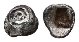 Asia Minor, Uncertain mint (probably Caria). AR Hemiobol, 0.30 g. - 6.27 mm. 6th century BC.
Obv.: Spiral pattern. (human eye).
Rev.: Incuse square pu...