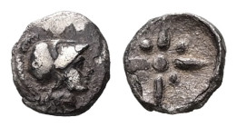 Asia Minor, uncertain or Troas, Kolone. AR, Tetartemorion 0.17 g. - 7.26 mm. Circa 500-400 BC.
Obv.: Helmeted head of Athena right.
Rev.: Star of four...