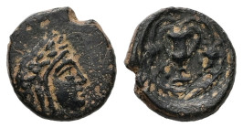 Bithynia, Kios. AE, 1.69 g. - 12.88 mm. 3rd century BC.
Obv.: Head of Mithras right, wearing a laureate tiara.
Rev.: K-I. Kantharos with two grape vin...