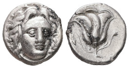 Caria, Rhodes. AR Didrachm, 6.62 g. - 18.75 mm. Circa 305-275 BC.
Obv.: Head of Helios facing, turned slightly to right.
Rev.: [POΔION], Rose with bud...