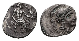 Cilicia, Uncertain. AR Obol, 0.71 g. - 11.76 mm. 4th Century BC.
Obv.: Baaltars seated right, eagle alighting on outstretched hand, holding lotus-tipp...