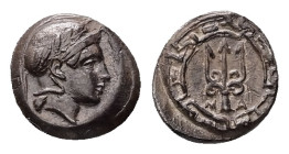 Ionia, Magnesia ad Maeandrum. AR Obol, 0.83 g. - 9.41 mm. Circa 400-350 BC.
Obv.: Helmeted head of Athena right.
Rev.: M - A. Trident within circular ...
