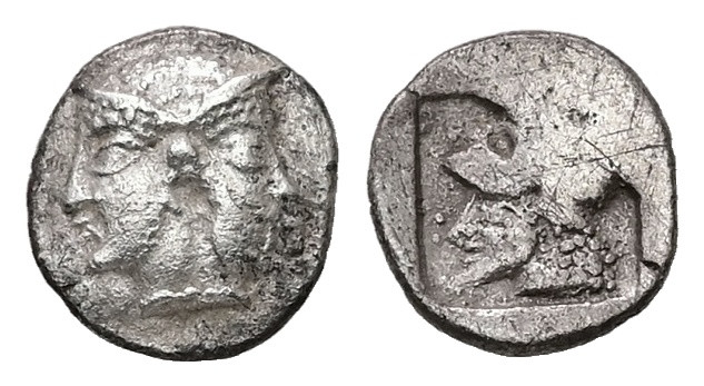 Mysia, Lampsakos. AR Obol, 0.65 g. - 9.45 mm. Circa 500-450 BC.
Obv.: Janiform f...