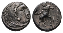 Kings of Macedon, Philip III Arrhidaios, AR Drachm, 3.83 g. - 15.35 mm. 323-317 BC. Side.
Obv.: Head of Herakles right, wearing lion skin.
Rev.: ΦΙΛΙΠ...