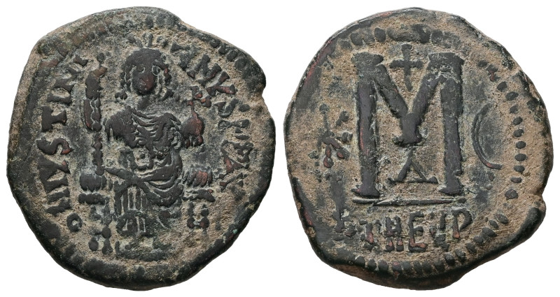 Justinian I, AD 527-565. AE, Follis. 16.89 g. 32.23 mm. Theoupolis (Antioch).
Ob...