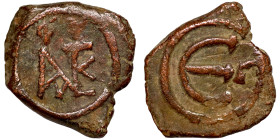 Byzantine bronze coin

15mm 2,00g