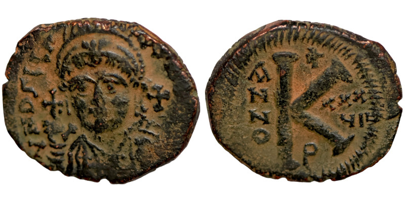 Byzantine bronze coin

29mm 9,17g

 Artifically sand patina