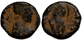 Byzantine bronze coin

9mm 1,17g

 Artifically sand patina