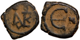 Byzantine bronze coin

12mm 1,75g

 Artifically sand patina