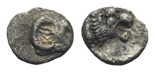 Caria, Uncertain. Tetartemorion circa 420-350 BC. AR 6.04 mm, 0.19 g. 
Obverse o...