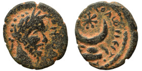 MESOPOTAMIA. Carrhae. Septimius Severus, 193-211. Ae (bronze, 1.54 g, 14 mm). Laureate head of Septimius Severus to right. Rev. Star-in-crescent set o...