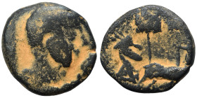 MESOPOTAMIA. Rhesaena. Elagabalus, 218-222. (bronze, 6.26 g, 19 mm). Radiate head of Elagabalus right. Rev. Sagittarius running right, behind, vexillu...