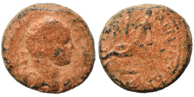 MESOPOTAMIA. Rhesaena. Caracalla or Elagabalus, 197-222. Ae (bronze, 7.84 g, 20 mm). Laureate head right. Rev. ΡΗϹΑΙΝΗϹΙωΝ (?) Female river god reclin...
