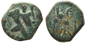 Provincial. Ae (bronze, 1.21 g, 11 mm). Turreted bust of Tyche right. Rev. Uncertain. Nearly very fine.