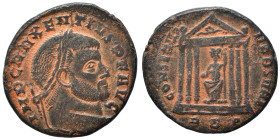 Maxentius, 307-210. Follis (bronze, 5.94 g, 25 mm), Aquileia. IMP C MAXENTIVS P F AVG Laureate head right. Rev. CONSERV VRB SVAE Roma seated facing, h...