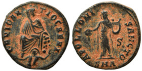 Time of Maximinus II, 310-313. Follis (bronze, 1.72 g, 15 mm), ‘Persecution’ issue, Antioch. GENIO ANTIOCHENI Tyche of Antiochia seated facing on rock...