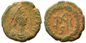 Marcian, 450-457. Nummus (bronze, 1.24 g, 11 mm), Cyzicus. D N MARCIANVS P F AV Diademed, draped and cuirassed bust right. Rev. Monogram in wreath. RI...