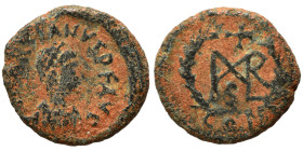 Marcian, 450-457. Nummus (bronze, 0.89 g, 11 mm). D N MARCIANVS P F AV Diademed, draped and cuirassed bust right. Rev. Monogram in wreath. Nearly very...