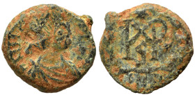 Marcian, 450-457. Nummus (bronze, 1.02 g, 10 mm). D N MARCIANVS P F AV Diademed, draped and cuirassed bust right. Rev. Monogram in wreath. Good fine.