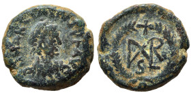 Marcian, 450-457. Nummus (bronze, 1.57 g, 11 mm), Uncertain mint. DN MARCIANVS PF AVG Diademed, draped, cuirassed bust right. Rev. Monogram with cross...