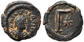 Justin I, 518-527. 3 Nummi (bronze, 1.29 g, 12 mm), Thessalonica. Diademed, draped, and cuirassed bust right. Rev. Large Γ; star to right. DOC 26; SB ...