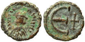 Justinian I, 527-565. Pentanummium (bronze, 1.01 g, 11 mm). Diademed, draped and cuirassed bust right. Rev. Large Є, cross to right. Nearly very fine....