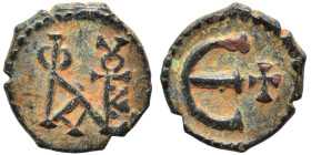 Justin II, 565-578. Pentanummium (bronze, 1.75 g, 14 mm), Theoupolis (Antioch). Monogram of Justin II. Rev. Large Є, cross to right. SB 386. Very fine...