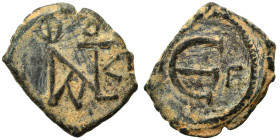 Justin II, 565-578. Pentanummium (bronze, 1.47 g, 15 mm), Theoupolis (Antioch). Monogram of Justin II. Rev. Large Є, cross to right. SB 386. Very fine...