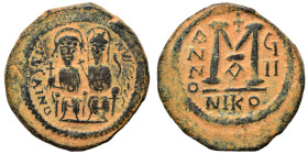 Justin II, with Sophia, 565-578. Follis (bronze, 14.50 g, 32 mm), Nicomedia. Justin, holding globus cruciger, and Sophia, holding cruciform scepter, s...