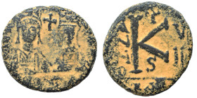 Justin II, with Sophia, 565-578. Half Follis (bronze, 8.08 g, 21 mm), Carthage. Facing busts of Justin II, on the left, helmeted and cuirassed, and So...