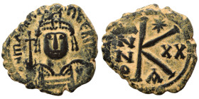 Maurice Tiberius, 582-602. Half follis (bronze, 5.90 g, 23 mm), Constantinople. Crowned and cuirassed bust facing, holding globus cruciger and shield ...