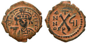 Maurice Tiberius, 582-602. Decanummium (bronze, 2.72 g, 19 mm), Theoupolis (Antioch). Crowned bust facing, holding mappa and eagle-tipped scepter. Rev...