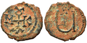 Maurice Tiberius, 582-602. Pentanummium (bronze, 1.70 g, 15 mm), Theoupolis (Antioch). Monogram. Rev. Large Ч; above, cross. DOC -. SB 539. Nearly ver...