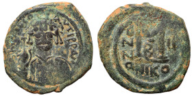 Maurice Tiberius, 582-602. Follis (bronze, 12.37 g, 31 mm), Nicomedia. Maurice Tiberius facing, wearing crown surmounted with cross and consular robes...