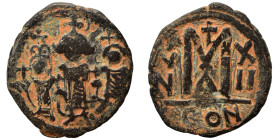 Heraclius, with Martina and Heraclius Constantine. 610-641. Follis (bronze, 3.66 g, 23 mm), Constantinople. Heraclius, in center, flanked by Martina, ...