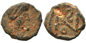 Odovacar, in the name of Zeno, 476-493. Ae (bronze, 0..5 g, 8 mm). Draped and diademed bust of Zeno to right. Rev. Monogram of Odovacar within wreath ...